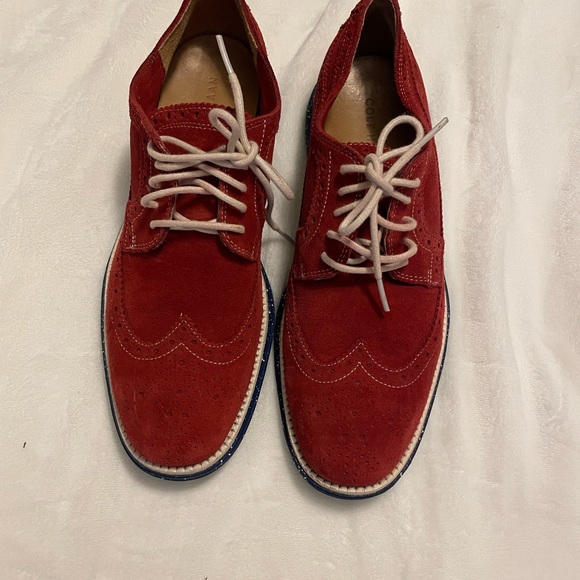 Like new but never worn, reddish color with cream she string. - Picture 1 of 7